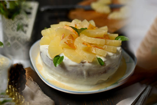 Pina Colada Tres Leches Cake: Soft sponge soaked in a coconut-infused Tres Leches blend, topped with coconut cream and fresh pineapple slices.